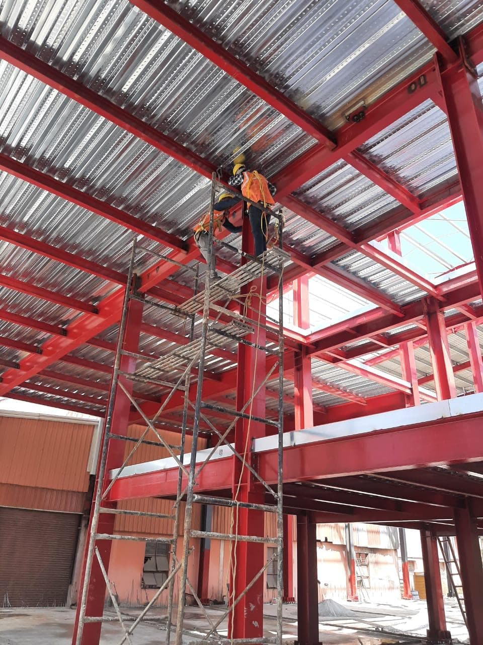 Steel frame being erected for a pre-engineered industrial building on an ACIPL site